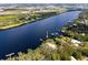 Aerial view highlighting the home's waterfront access and private dock at 505 S 56Th St, Tampa, FL 33619