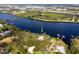 Aerial showcasing the property's waterfront position and surrounding environment at 505 S 56Th St, Tampa, FL 33619