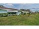 House exterior showcasing a light blue color and neat landscaping at 2607 Lancaster Dr # 35, Sun City Center, FL 33573