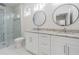 Elegant bathroom with double vanity and glass shower at 2010 1/2 E Wood St # St, Tampa, FL 33604
