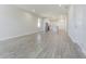 Spacious living room with grey wood-look floors at 2010 1/2 E Wood St # St, Tampa, FL 33604