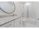 Clean bathroom with granite countertop and bathtub at 2010 1/2 E Wood St # St, Tampa, FL 33604
