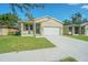 Newly constructed home with a one-car garage at 2010 E Wood St, Tampa, FL 33604