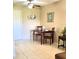 Bright dining area with table, chairs, and neutral wall paint at 2390 Shelly Dr # D, Palm Harbor, FL 34684