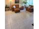 Cozy living room featuring tile floors and comfortable leather seating at 2390 Shelly Dr # D, Palm Harbor, FL 34684