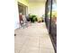 Relaxing screened patio with tile flooring and comfortable seating at 2390 Shelly Dr # D, Palm Harbor, FL 34684