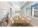 Elegant dining room featuring a long wooden table and ample seating at 4748 Hickory Oak Dr, Brooksville, FL 34601