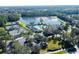 Aerial view of community amenities including tennis courts and pool at 4748 Hickory Oak Dr, Brooksville, FL 34601