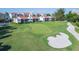 Scenic golf course view highlighting lush green fairways, pristine sand traps, and nearby residential buildings at 5825 Puerta Del Sol S Blvd # 170, St Petersburg, FL 33715