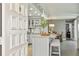 Modern kitchen with white cabinets, granite countertops, and a stylish island with seating at 5825 Puerta Del Sol S Blvd # 170, St Petersburg, FL 33715