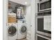 Efficient laundry area with modern washer, dryer, and built-in appliances at 5825 Puerta Del Sol S Blvd # 170, St Petersburg, FL 33715