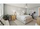 Serene main bedroom featuring a bed with plush pillows, neutral colors, and soft carpet at 5825 Puerta Del Sol S Blvd # 170, St Petersburg, FL 33715