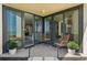 Inviting patio with comfortable seating and scenic views through sliding glass doors at 5825 Puerta Del Sol S Blvd # 170, St Petersburg, FL 33715