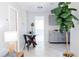 Modern kitchen with gray cabinets and white appliances at 8441 Paxton Dr, Port Richey, FL 34668