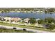 Aerial view of a beautiful waterfront community with single-Gathering homes at 2706 Mingo Dr, Land O Lakes, FL 34638