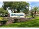 Highland Lakes Club community entrance sign at 2390 Shelly Dr # D, Palm Harbor, FL 34684