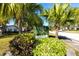 Villa Condo community entrance with lush landscaping at 2390 Shelly Dr # D, Palm Harbor, FL 34684
