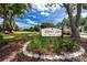Highland Lakes Golf Club entrance sign at 2390 Shelly Dr # D, Palm Harbor, FL 34684