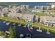 Aerial view of the condos showing the waterfront access, boat docks, and lush landscaping at 8246 Aquila St, Port Richey, FL 34668