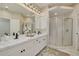 Bathroom boasts double vanity, shower, and modern fixtures at 8246 Aquila St, Port Richey, FL 34668