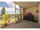 Screened patio with water view, grill, and ample space at 8246 Aquila St, Port Richey, FL 34668