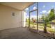 Enjoy the screened lanai with tropical landscaping and tranquil views of the community canal at 8246 Aquila St, Port Richey, FL 34668