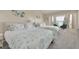 Guest bedroom with two twin beds and coastal decor at 8246 Aquila St, Port Richey, FL 34668