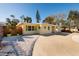 Charming yellow house with a landscaped yard and driveway at 6614 10Th Avenue S Ter, St Petersburg, FL 33707