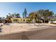 Ranch style yellow house with palm trees at 6614 10Th Avenue S Ter, St Petersburg, FL 33707