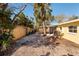 Spacious backyard with gravel and trees at 6614 10Th Avenue S Ter, St Petersburg, FL 33707
