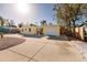 Yellow house with palm trees and a rock driveway at 6614 10Th Avenue S Ter, St Petersburg, FL 33707