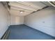 Spacious garage with white walls and a concrete floor at 6614 10Th Avenue S Ter, St Petersburg, FL 33707