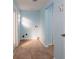 Laundry room with tile floor, light blue walls, and exterior access at 6614 10Th Avenue S Ter, St Petersburg, FL 33707