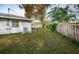 Backyard with shed and grassy area at 1480 Sunset Point Rd, Clearwater, FL 33755