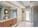 Bathroom with shower, toilet and exterior access at 1970 Illinois Ave Ne, St Petersburg, FL 33703