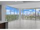 Living room with floor to ceiling windows and city views at 777 3Rd N Ave # 1203, St Petersburg, FL 33701