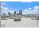 Modern rooftop patio with fire pit and city views at 777 3Rd N Ave # 1203, St Petersburg, FL 33701