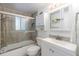 Clean bathroom with a shower/tub combo and modern vanity at 425 Treasure Rd, Venice, FL 34293