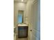 Vanity with granite countertop, and stainless steel faucet, in the bathroom at 1027 Ocean Spray Dr, Ruskin, FL 33570
