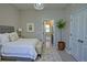 Neutral bedroom with ensuite access to bathroom at 1027 Ocean Spray Dr, Ruskin, FL 33570