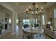 Open floorplan with a dining area, view of living room, and neutral decor at 1027 Ocean Spray Dr, Ruskin, FL 33570