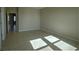 Spacious living room featuring tile floors and plenty of natural light at 1027 Ocean Spray Dr, Ruskin, FL 33570