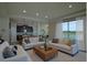 Open-concept living room with kitchen, comfortable seating, and scenic views at 1027 Ocean Spray Dr, Ruskin, FL 33570