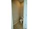 Neutral colored powder room with tiled floors at 1027 Ocean Spray Dr, Ruskin, FL 33570