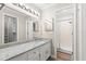 Bathroom with a granite vanity top, and glass-door shower at 104 Cypress Pond Rd, Palm Harbor, FL 34683