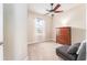 Bright bedroom with carpeted floor, ceiling fan, and ample closet space at 1504 Ringmore Ct, Dover, FL 33527