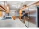 Kitchen with stainless steel appliances and wood cabinets at 37449 Gill Ave, Zephyrhills, FL 33541