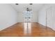 Large bedroom with hardwood floors and dual window at 37449 Gill Ave, Zephyrhills, FL 33541