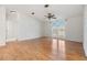 Bright living room with hardwood floors and large windows at 37449 Gill Ave, Zephyrhills, FL 33541