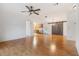 Open living room with hardwood floors and barn doors at 37449 Gill Ave, Zephyrhills, FL 33541